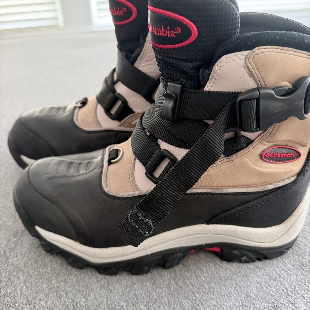 Columbia women's insulated waterproof snow boots featuring a buckle strap